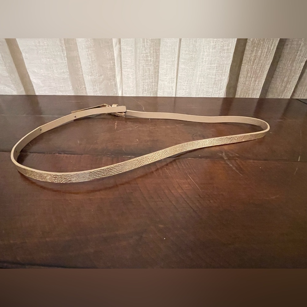 Gold leather belt.